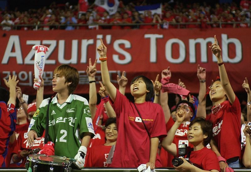 South Korea fans celebrate after they stunned Italy in the last 16.